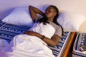 a man sleeping on a MoKo mattress