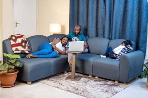 couple watching a movie while chilling on a Djenga sofa